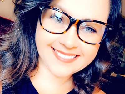 A headshot of Ashleigh Coker, who earned her BA in English Language and Literature from SNHU in 2021.