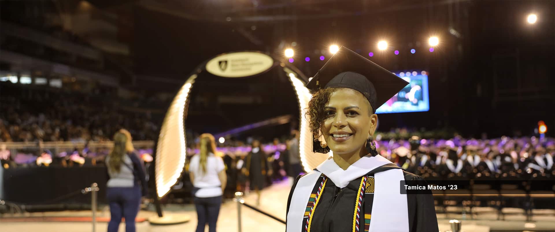Tamica Matos, who earned her degree at SNHU in 2023, wearing her cap and gown.