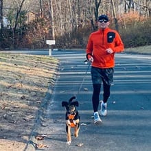 Robert Bruce running with his dog