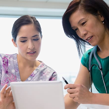 A CNE showing a nurse how to become a nurse educator.