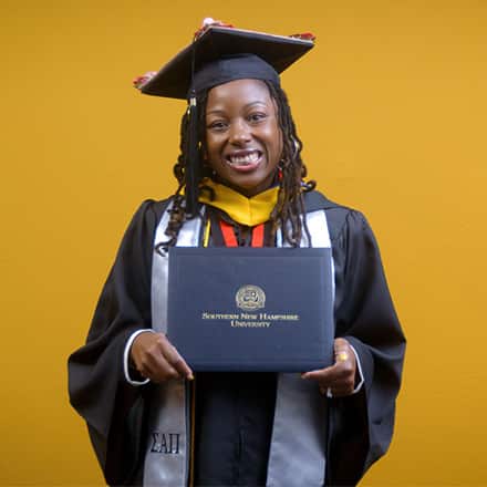 Christina Cumberbatch, a 2025 graduate from SNHU with a bachelor's in business administration.