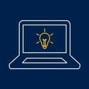 An icon of a laptop with a yellow lightbulb on its screen.