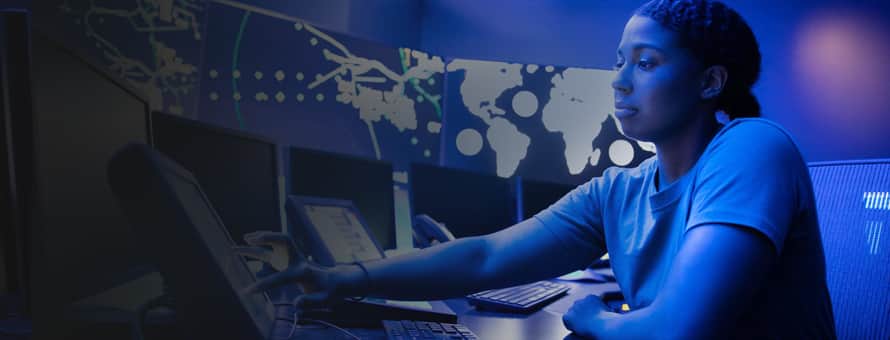 A woman working a cyber security position