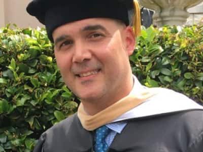 Dr. Deane Desper, an adjunct professor at SNHU, wearing his graduation regalia.
