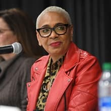 SNHU Board of Trustee Janiece Y. Evans-Page listening to other panelists speak at SNHU’s Women on Board event