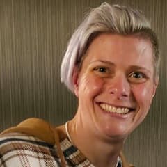 Gina Cramer, a bachelor's in cybersecurity graduate and instructor at SNHU.