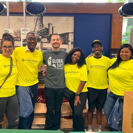 Six volunteers supporting the Charlotte RaceFest Packet Pickup project for SNHU’s Global Days of Service.