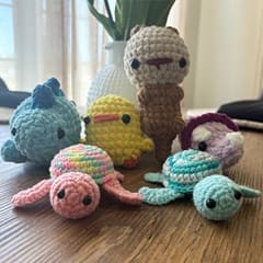 6 knitted/crocheted animals for an SNHU Global Days of Service project that will donate comfort items to a hospice center.