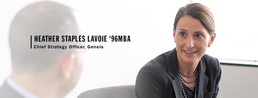 Heather Staples Lavoie ‘96MBA conducting a meeting with collugues