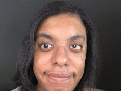 Jamilla Geter, who earned her MFA from SNHU in 2021.