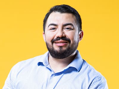 Jesus Suarez, who earned his bachelor's degree in graphic design and media arts in 2021.