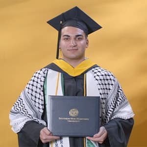 Jonathan Oubenslimane, a 2024 bachelor's in business administration graduate from SNHU.