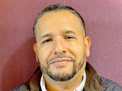 Juan Quiroz, who earned his MBA from SNHU in 2022.