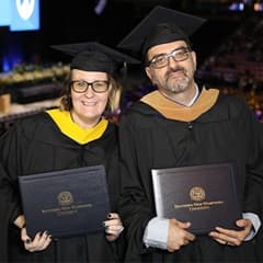 Kathy Mota '23G and Marco Mota '23G, SNHU graduates.