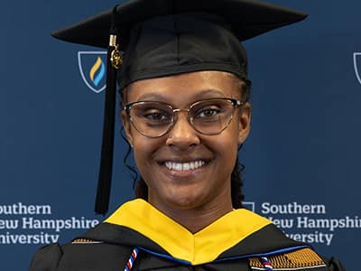 Keshay Randle, who graduated from SNHU in 2024, wearing her graduation cap
