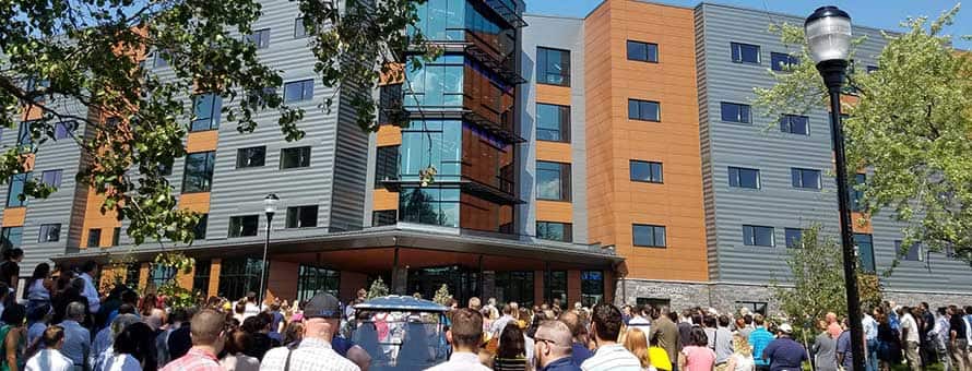 Crowd of people outside Kingston Hall