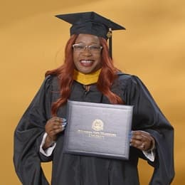 Lilian Ongaki, a 2024 SNHU graduate who earned her master's degree in healthcare administration.