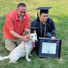 Cameron Gray, left, with Loretta Gray, right, and dog Vegas, bottom.