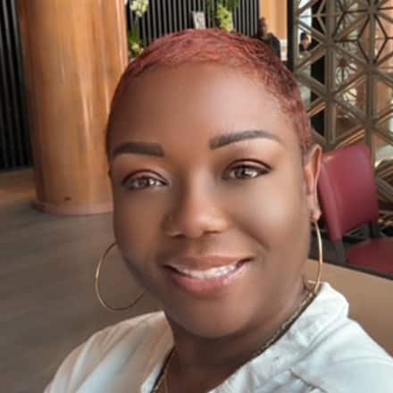 Martine Georges-Powell, a UMA graduate with a BS in Healthcare Administration and MBA from SNHU.