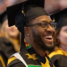 Matthew Seawright in his cap and gown at SNHU's Commencement.
