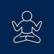 An icon of a person meditating with their hands up.