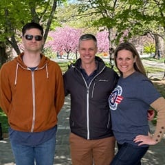 Melissa Mosher, right, with her husband, center, and their son, left.