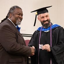 Nate Lohn accepting an award