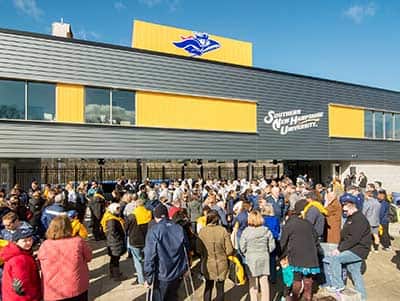A crowd of people outside the newly opened Penmen Stadium.
