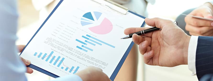 Corporate team of employees working to improve the triple bottom line