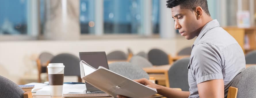 Student studying inside a library