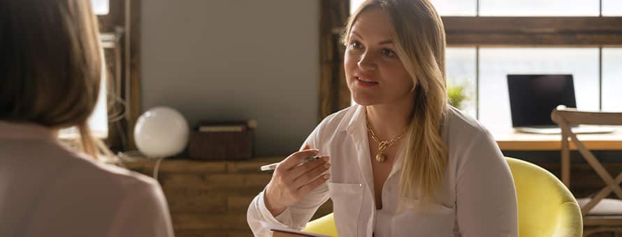 A woman speaks to another woman to help her decide if she should become a psychology major