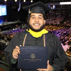 Remus Figueroa Orozco, an SNHU graduate with his bachelors degree in cybersecurity.