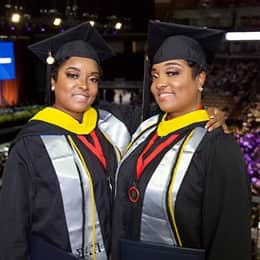 Identical twins Sheila and Sharla Barnes, who both earned their bachelor's degrees in criminal justice at SNHU.
