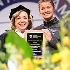 Susan Nathan, SNHU chief experience officer, left, with Tiffany Eaton, an Excellence in Teaching Award recipient, right.