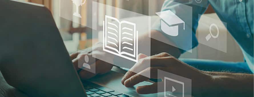 A person using a laptop to research what credit hours are with floating icons of a book, graduation cap, magnifying glass, person and trophy.