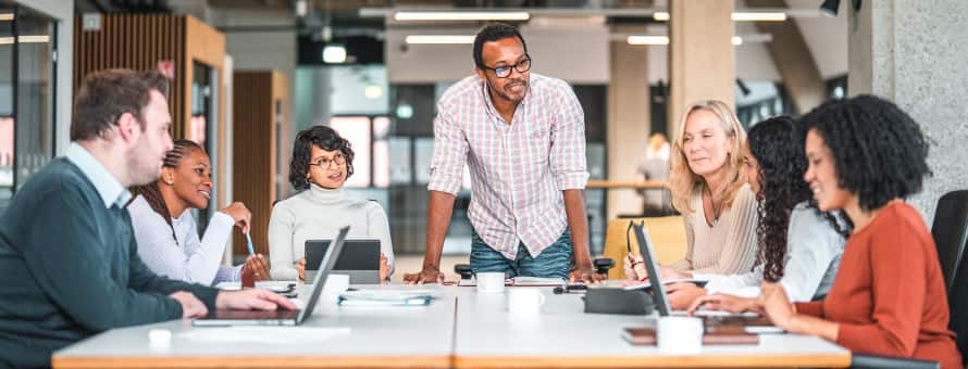 A group of professionals discussing what operations managers do