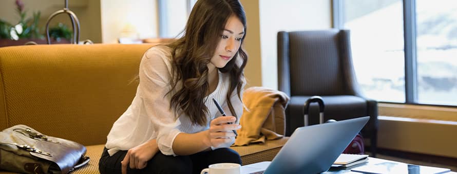 A woman reading a scholarly source.