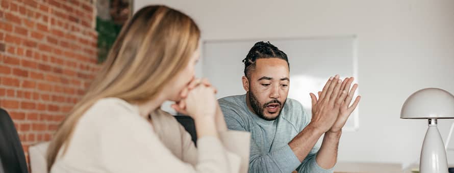 Two people having a conversation about how to be successful in the workplace