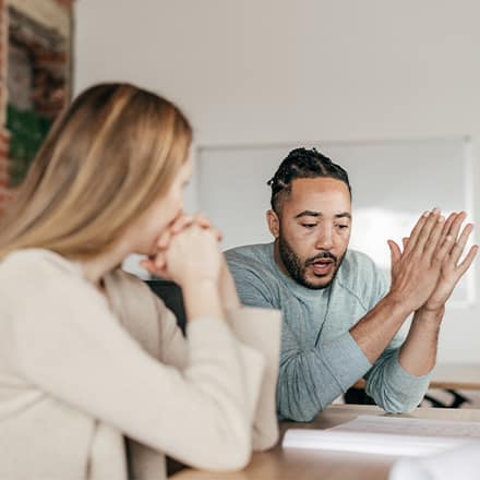 Two people having a conversation about how to be successful in the workplace