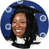 Adanze Chukwuocha, a Maryland resident and SNHU graduate, wearing her cap and gown.