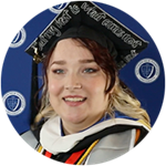 Analiece Clark, an SNHU graduate and Arkansas resident, wearing her cap and gown